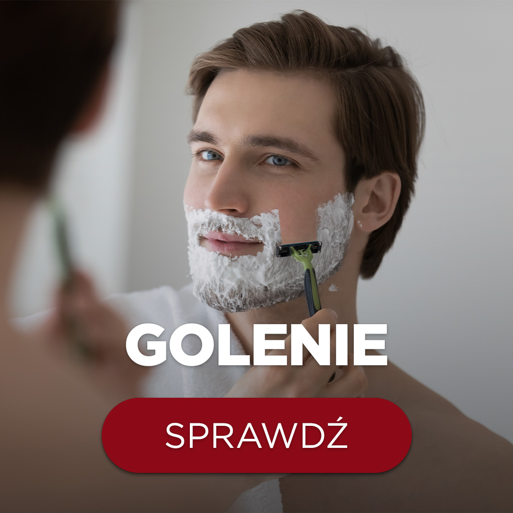 Mężczyzna golący się maszynką przed lustrem - golenie